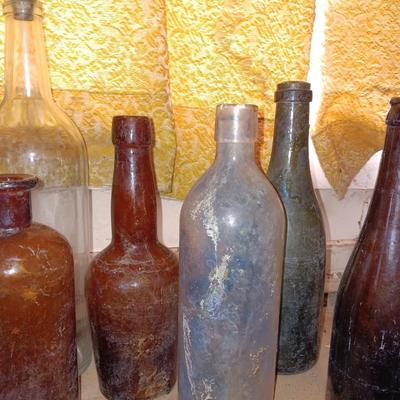 Variety of vintage glass bottles