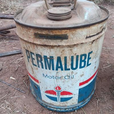 Three vintage metal containers - Permalube - Ford Hydraulic - and Super motor oil