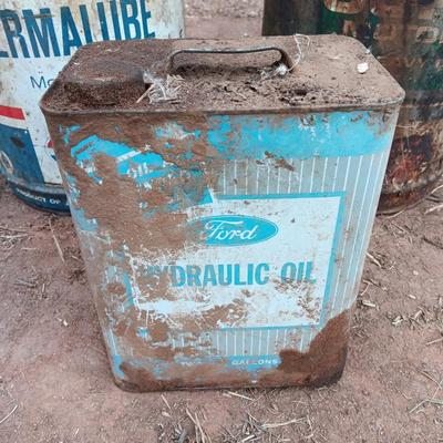 Three vintage metal containers - Permalube - Ford Hydraulic - and Super motor oil