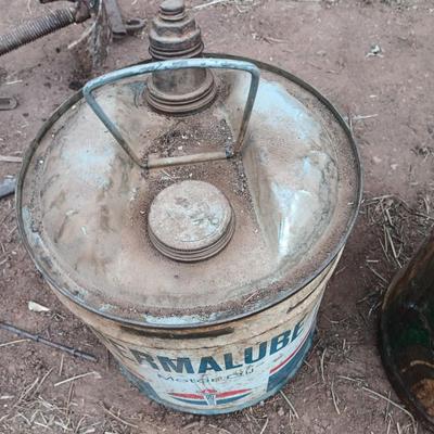 Three vintage metal containers - Permalube - Ford Hydraulic - and Super motor oil