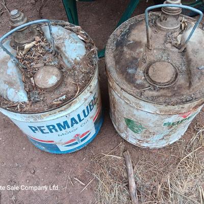 Two vintage Oil cans Permaube and Super Motor metal cans