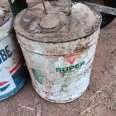 Two vintage Oil cans Permaube and Super Motor metal cans