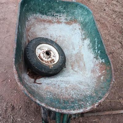 Metal wheelbarrow with extra tire