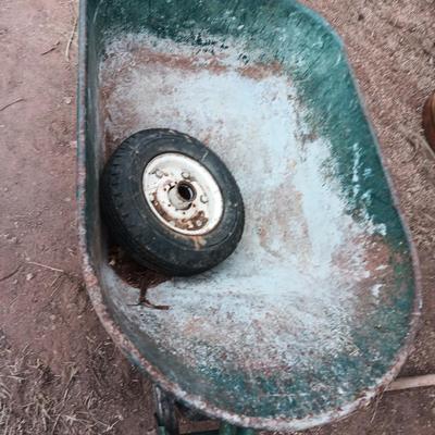 Metal wheelbarrow with extra tire