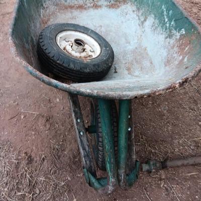 Metal wheelbarrow with extra tire