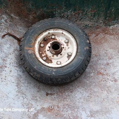 Metal wheelbarrow with extra tire