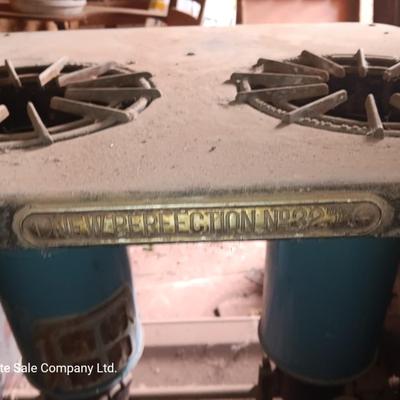 Antique early 1900's kerosene two burner stove with glass kerosene bottle