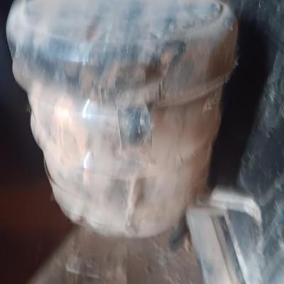 Antique early 1900's kerosene two burner stove with glass kerosene bottle