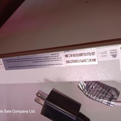 Vazillio LED adjustable arm grow light a with timer and an AFX model SLEU22GR Grow light. 1 of 2