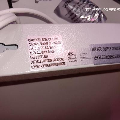 Vazillio LED adjustable arm grow light a with timer and an AFX model SLEU22GR Grow light. 1 of 2