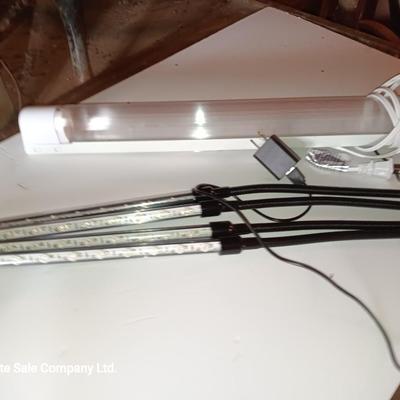 Vazillio LED adjustable arm grow light a with timer and an AFX model SLEU22GR Grow light. 2 OF 2