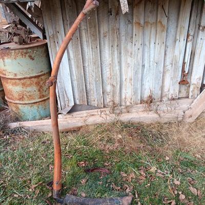 Antique wooden handled scythe with two handles