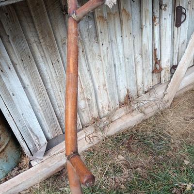Antique wooden handled scythe with two handles