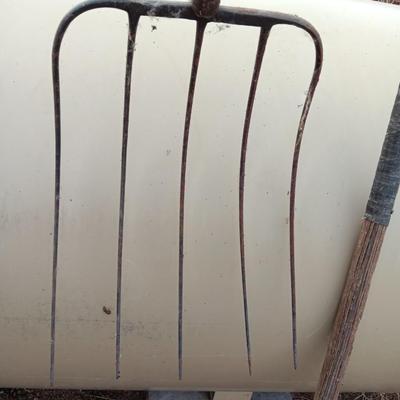 Two vintage pitchforks