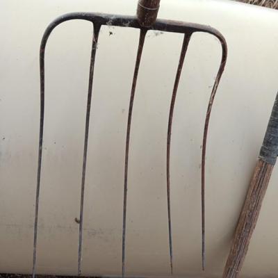 Two vintage pitchforks