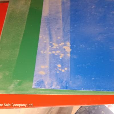 Box of colored Laser brass plated steel sheeting and pieces
