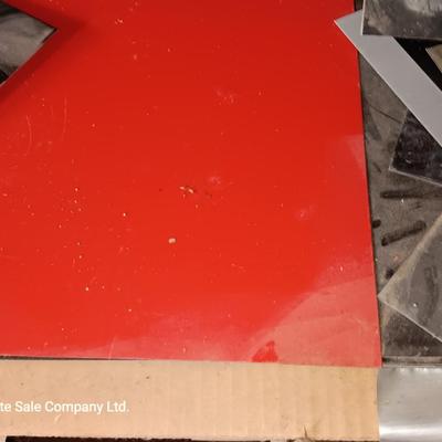 Box of colored Laser brass plated steel sheeting and pieces
