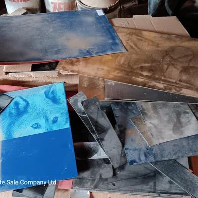 Box of colored Laser brass plated steel sheeting and pieces