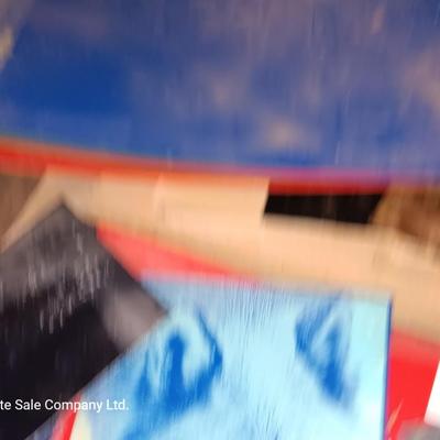 Box of colored Laser brass plated steel sheeting and pieces