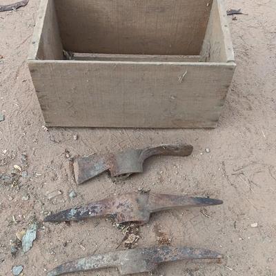 Wooden crate / Box with three vintage pickaxe heads - each a different style