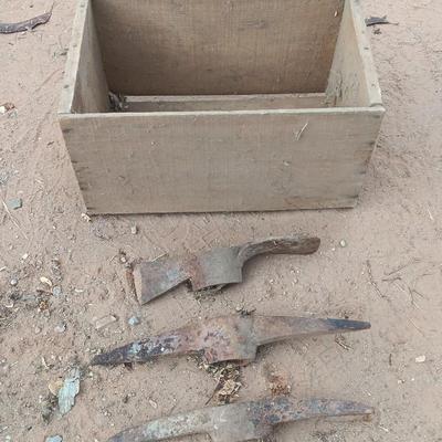 Wooden crate / Box with three vintage pickaxe heads - each a different style