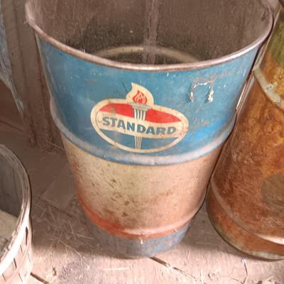 Two small Steel barrels -- standard and green faded - 27" x 14.5"