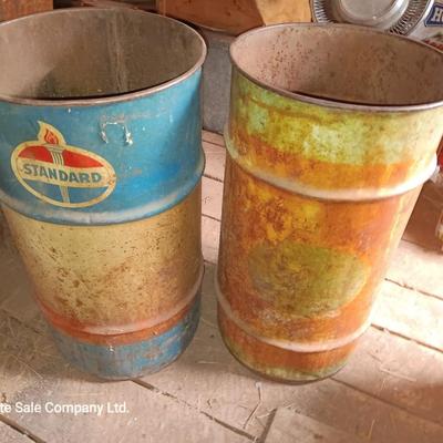 Two small Steel barrels -- standard and green faded - 27" x 14.5"
