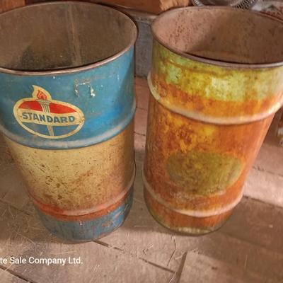 Two small Steel barrels -- standard and green faded - 27" x 14.5"