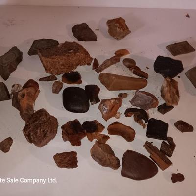 Rock collection in an old Ford metal can