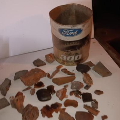 Rock collection in an old Ford metal can