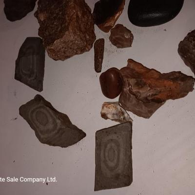 Rock collection in an old Ford metal can