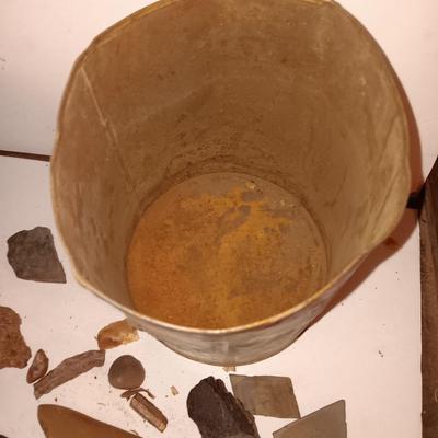 Rock collection in an old Ford metal can