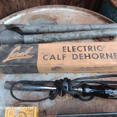 Lenk Electric calf dehorner and vintage crown weaning ring