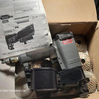 Senco Fastening systems SCN40R coil roofing Nailer with partial box of nails