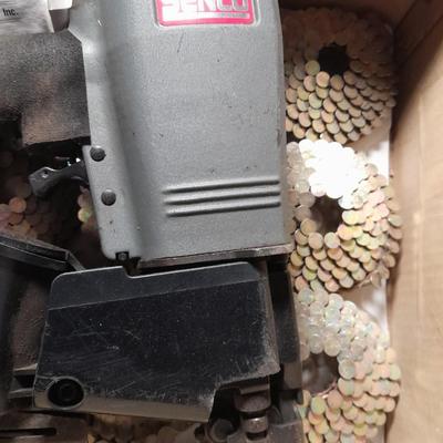 Senco Fastening systems SCN40R coil roofing Nailer with partial box of nails