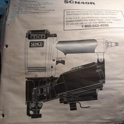 Senco Fastening systems SCN40R coil roofing Nailer with partial box of nails