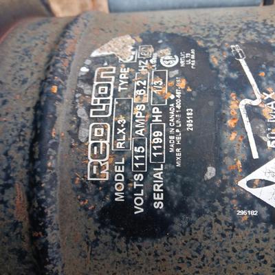 Two electric cement mixers