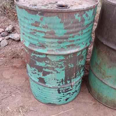 Three steel drums - barrels