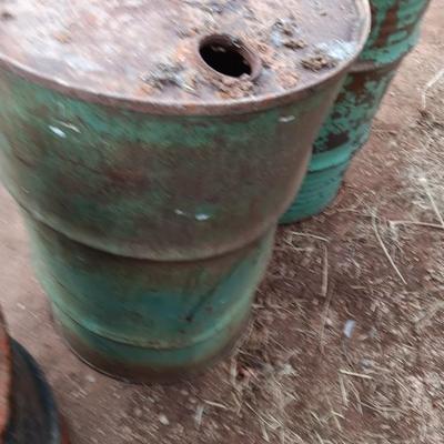 Three steel drums - barrels