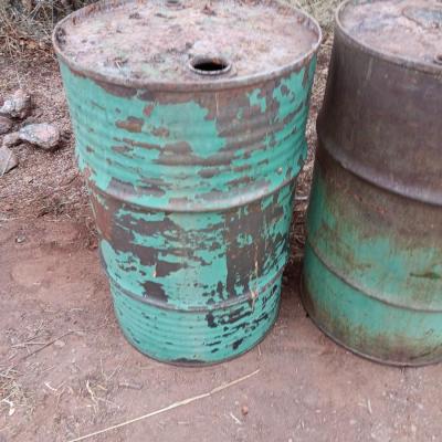 Three steel drums - barrels