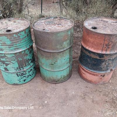 Three steel drums - barrels