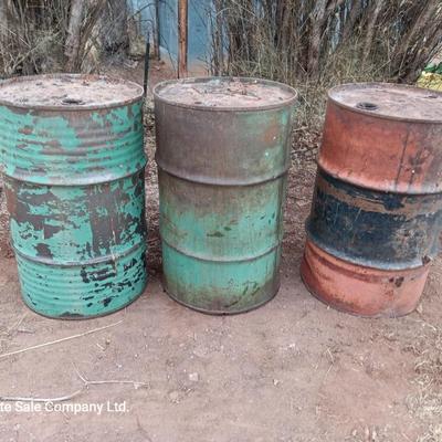 Three steel drums - barrels