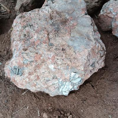 Collection of rocks some with Mica