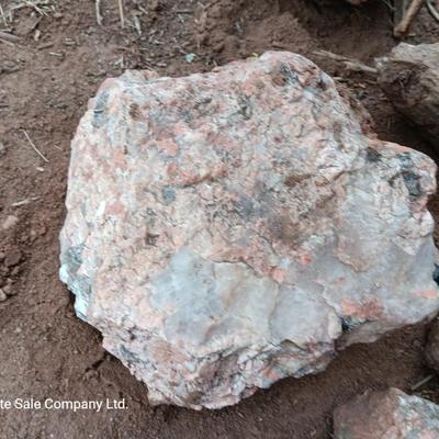 Collection of rocks some with Mica