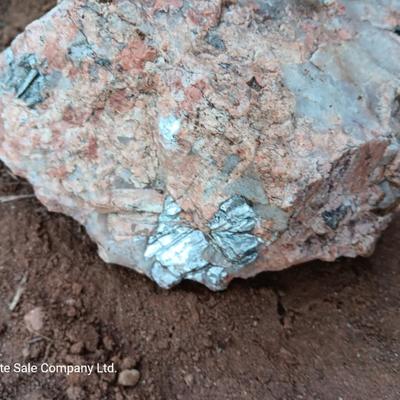 Collection of rocks some with Mica