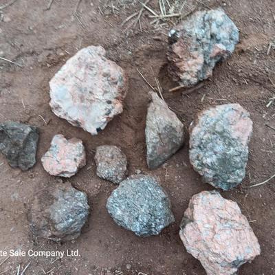 Collection of rocks some with Mica