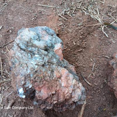 Collection of rocks some with Mica