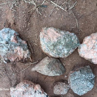 Collection of rocks some with Mica
