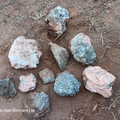 Collection of rocks some with Mica