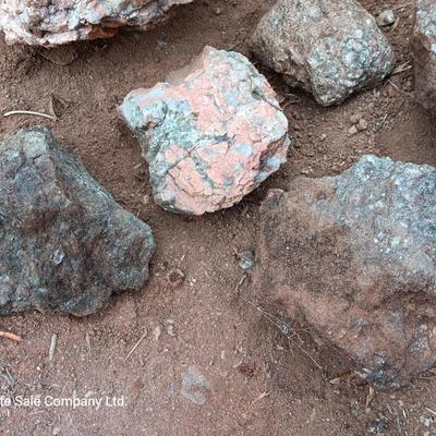 Collection of rocks some with Mica